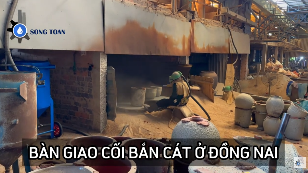 bàn giao cối phun cát